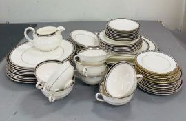 A mixed selection of dinner services of Wedgwood, Black Ulander and Royal Doulton Sarabande bone