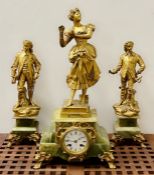 A French gilt metal and onyx statue garniture clock