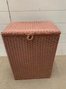 A Lloyd Loom lusty pink storage bin (H54cm W39cm D25cm)