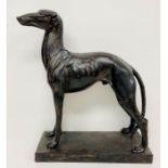 A faux sculpture of a greyhound