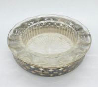 A silver and glass small bowl, marked Sterling silver