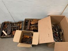 A large selection of vintage tools to include planes etc