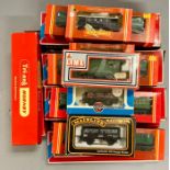 A large selection of boxed )) gauge rolling stock, boxed various makers etc.
