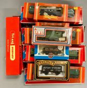 A large selection of boxed )) gauge rolling stock, boxed various makers etc.