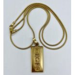 A 9ct gold ingot on 9ct gold chain. (Total Weight 13g)
