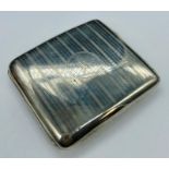 A hallmarked silver cigarette case, Birmingham, makers mark HWL