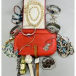 A selection of costume jewellery and coach bag