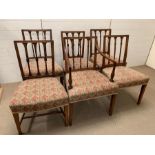 A set of 6 Sheraton mahogany dining chairs including 1 armchair, each with square back and 3