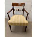 A Sheraton mahogany open armchair with broad top rail inlaid with boxwood stringing, horizontal