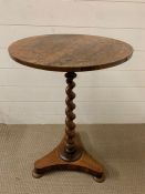 A rosewood occasional table on spiral centre support (H72cm Dia45cm)