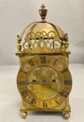 A brass lantern clock possibly 17th century AF (H38cm)