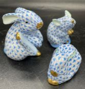 A Group of three Herend, porcelain figures in fishnet pattern, two rabbits and a mouse.