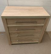 A four drawer contemporary chest of drawers (H99cm W92cm D44cm)