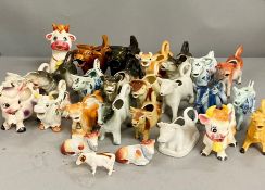 A selection of china cow creamers, various makers, years and countries of origin.