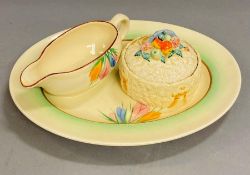 Three pieces of Clarice Cliff for Newport pottery
