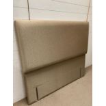 A four foot six padded headboard (H127cm)