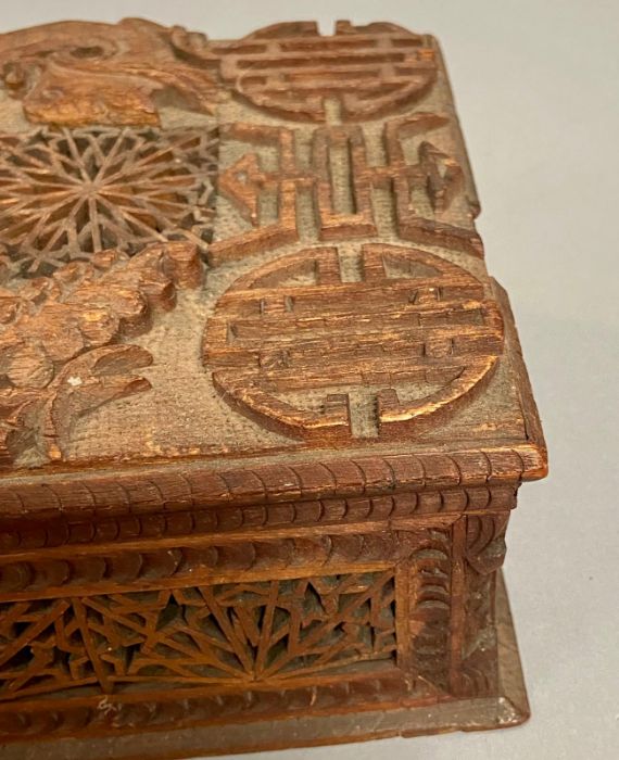 A carved Chinese box with dragon motif. - Image 4 of 4