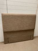 A four foot six padded headboard (H127cm)