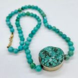 A Turquoise necklace, an early piece by Jane Diaz.