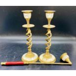 A pair of brass candlesticks and matching snuffer with mother of pearl inlay (H20cm)