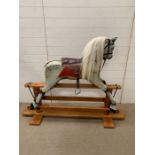 A rocking horse on pine stand, Bluebell nursery size (Saddle H88cm W116cm)