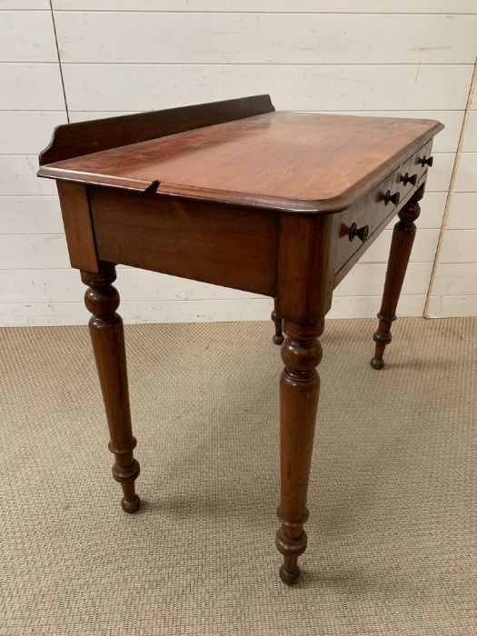 A mahogany wash stand on turn legs and drawers to centre AF (H79cm W90cm D49cm)Condition Report Chip - Image 5 of 5