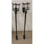 A pair if wrought iron hanging wall baskets (H127cm Dia28cm)