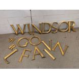 A selection of gilt plaster alphabet letters, seventeen in total