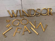 A selection of gilt plaster alphabet letters, seventeen in total