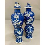 A pair of blue and white Chinese vases with lids AF and two smaller