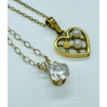 Two 9ct gold fine chains with pendants (2.5g)
