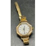 A 9ct gold Ladies watch on a rolled gold strap.