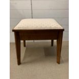 A Mid Century dressing table stool, opening up to storage (H50cm W50cm D37cm)