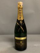 A Bottle of Moet & Chandon 2000 Grand Vintage champagne