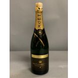 A Bottle of Moet & Chandon 2000 Grand Vintage champagne