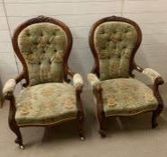 A pair of Victorian Rococo style carved frame open armchairs