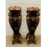 A pair of Italian gilt and ebony style lamp stands or plinths (H84cm Sq24cm)