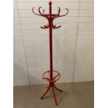 A red Bentwood Mid Century six hook coat stand by Drevounia Czechoslovakia