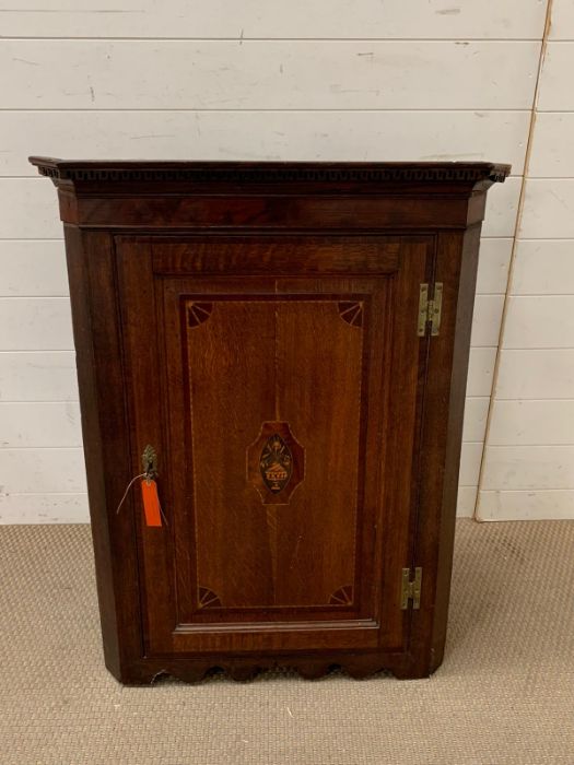 An inlaid wall hanging corner cabinet (H98cm W74cm D39cm)