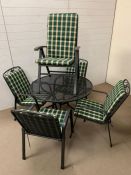 A Royal garden mesh table and chairs along with an umbrella