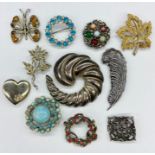 A selection of various brooches