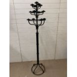 A metal floor standing candelabra with thirteen holders (H187cm W42cm)