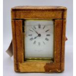 A Mappin and Webb, marked Paris quality carriage clock with Roman enamelled dial.