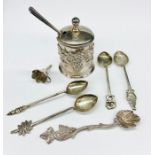 A small selection of silver curios including a mustard