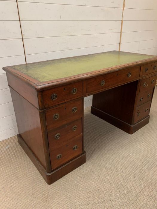 A pedestal desk with brass ring handles and leather top (H70cm W122cm D58cm) - Image 2 of 6