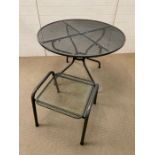A garden mesh table and foot stool