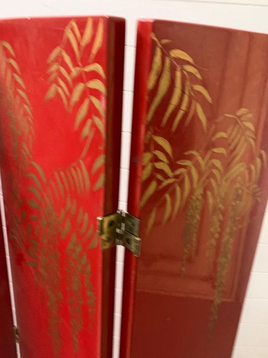 A signed four panel room divider or scren in a Chinese style on red grounds by Andrea Mart (1981) - Image 2 of 4