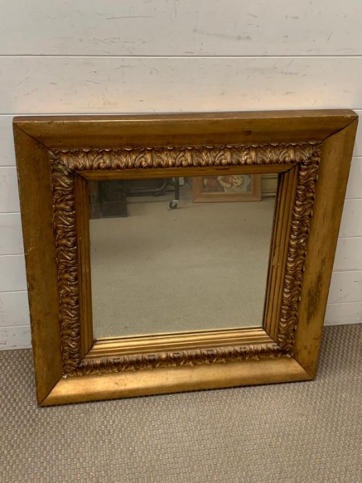 A square mirror (76cm x 78cm)