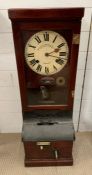 A British time recorder or clocking in clock, in mahogany case