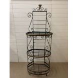 A Wrought iron decorative antique French bakers stand